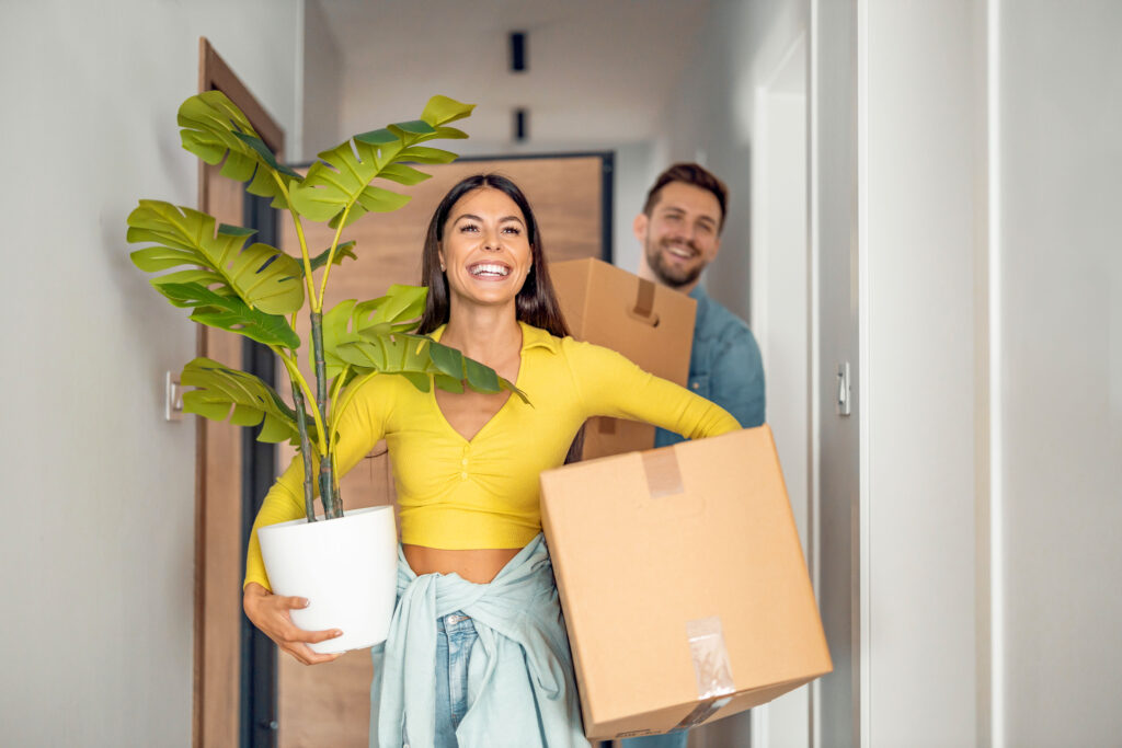 Young couple moving in new home