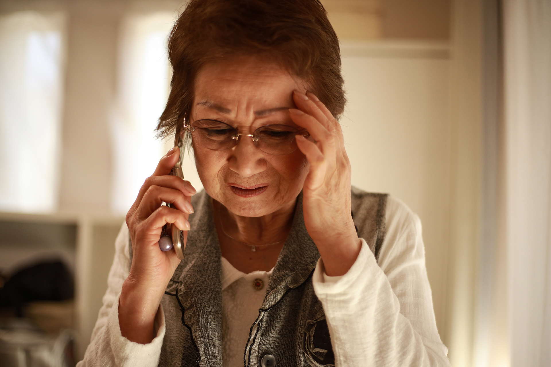 Concerned woman on the phone