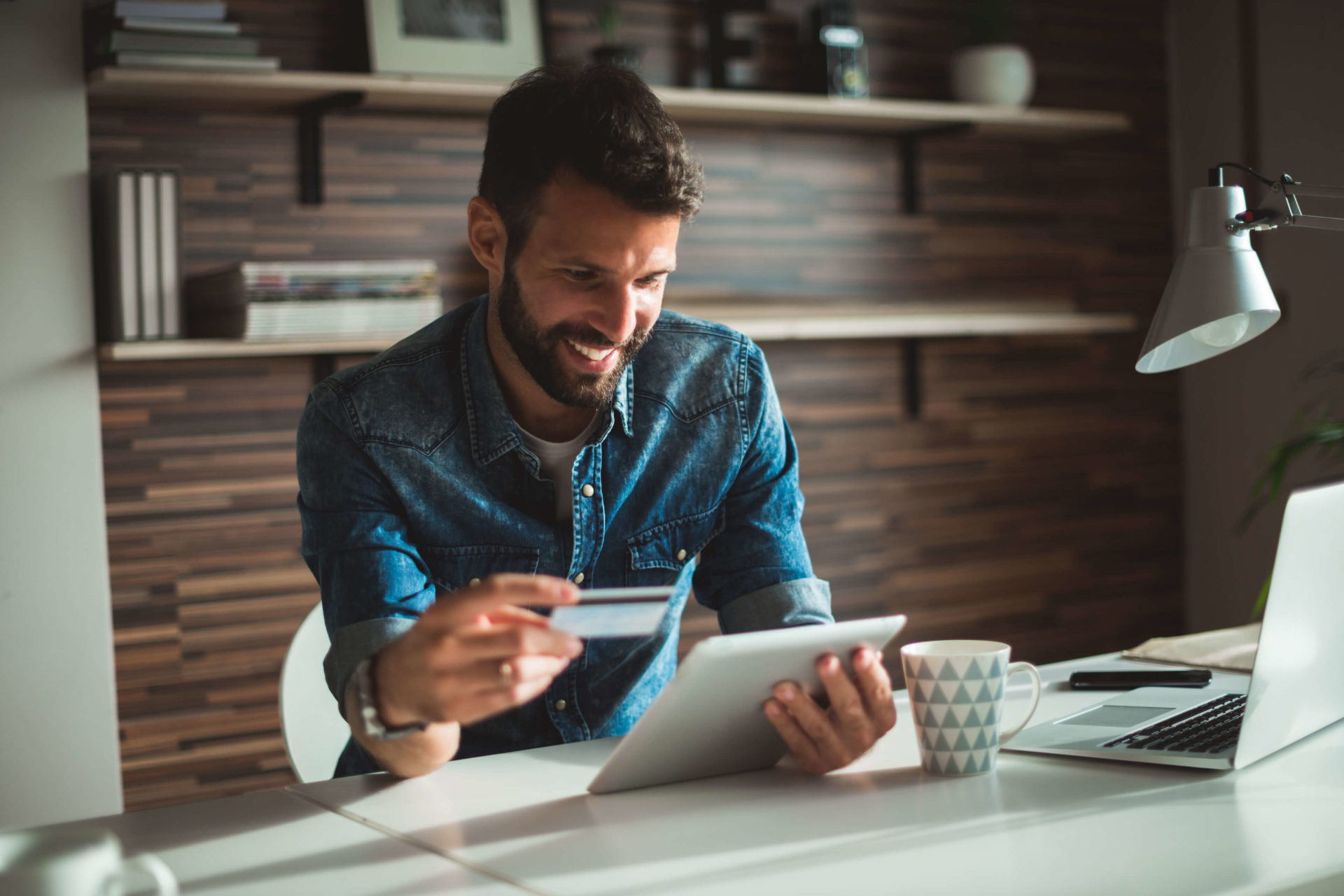 business owner holding credit card